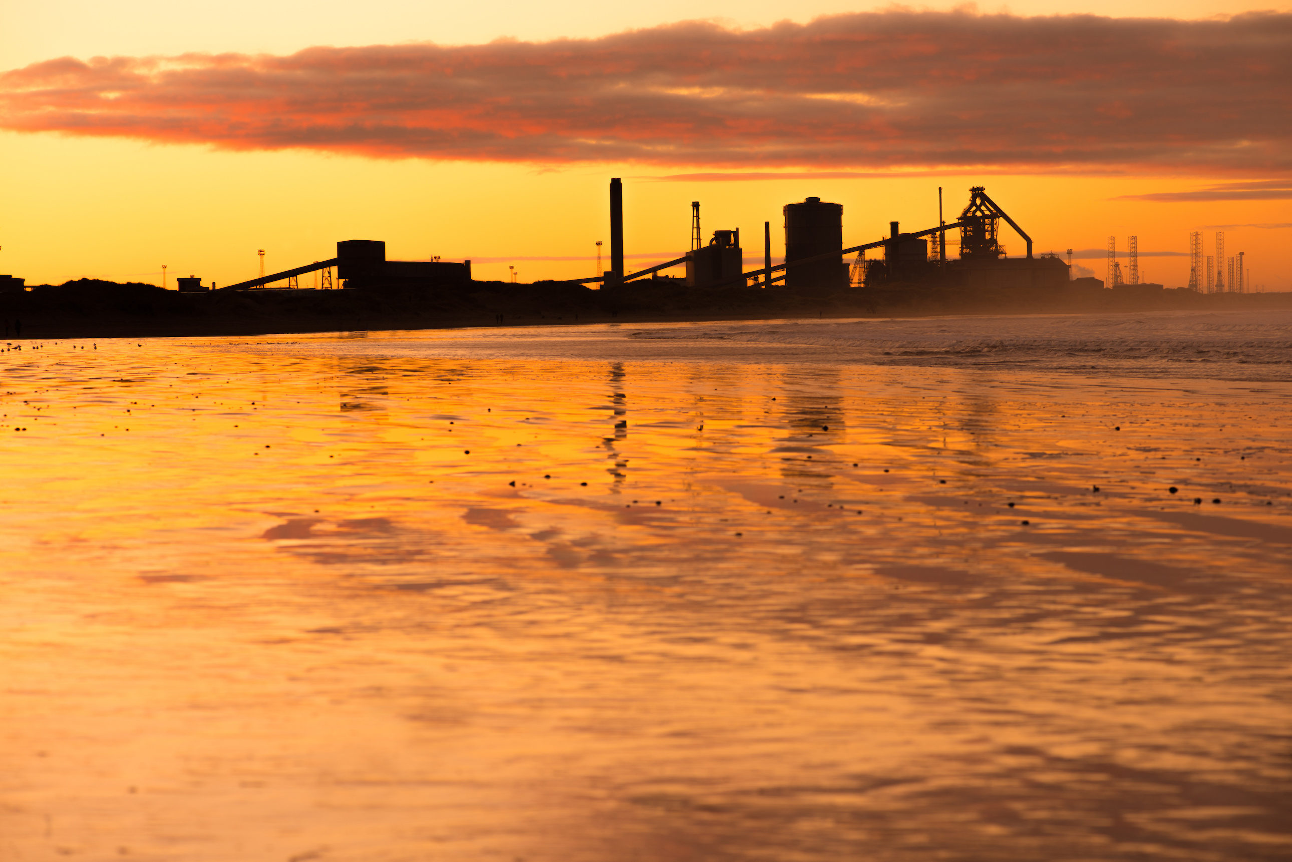 The sun sets on steelworks in Teeside, near Redcar.